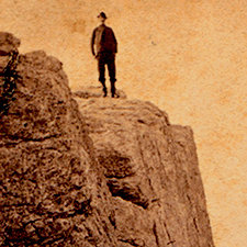 Man standing on Cliff at Star Island