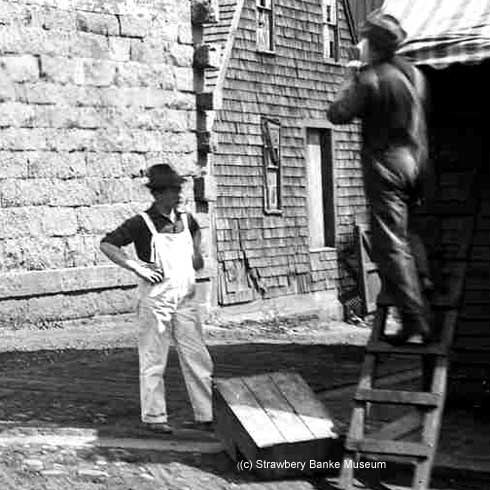 Two guys working at the Coal Store, Portsmouth, NH / Strawbery Banke Archive