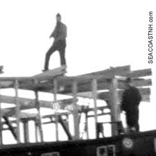 Crewmen cabbing over USS Constitution in Portsmouth Harbor (c) Strawbery Banke Collection on SeacoastNH.com